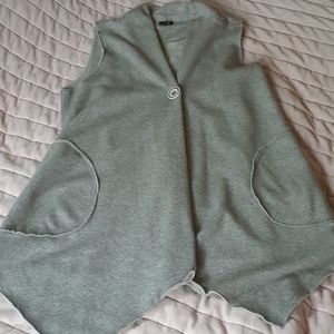 Pocketed long vest